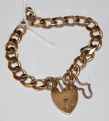 Lot 63 - A 9ct gold bracelet with 9ct gold heart-shaped...