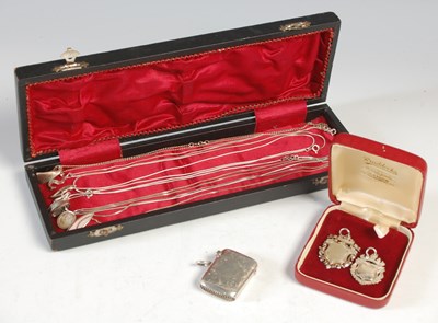 Lot 239 - A collection of silver items, to include an...