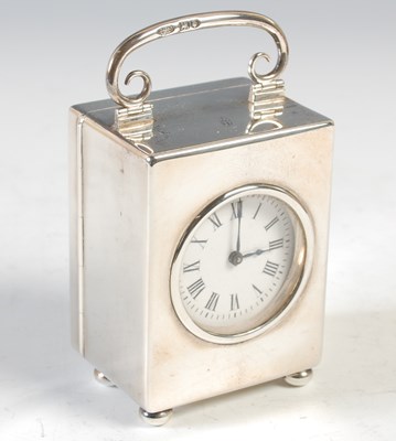 Lot 248 - An Edwardian silver cased carriage clock, with...