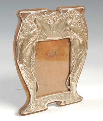 Lot 249 - An Art Nouveau silver mounted oak photograph...
