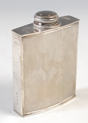 Lot 259 - An Art Deco engine turned hip flask, with...