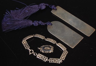 Lot 270 - Two silver plaque bookmarks; a silver bracelet;...