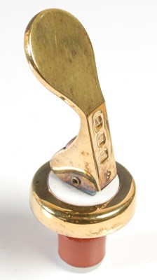 Lot 272 - A modern silver gilt wine bottle stopper, by...