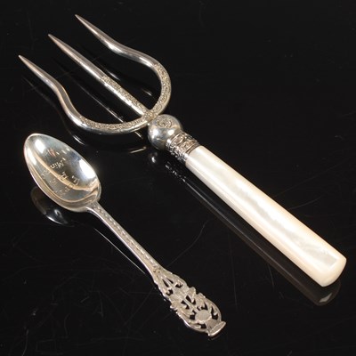 Lot 274 - A silver teaspoon, with pierced thistle finial...