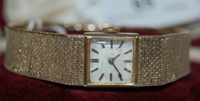 Lot 65 - A vintage 9ct gold Tudor bracelet watch, the...