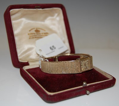 Lot 65 - A vintage 9ct gold Tudor bracelet watch, the...