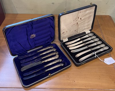Lot 291 - Two cased sets of six silver handled tea knives.