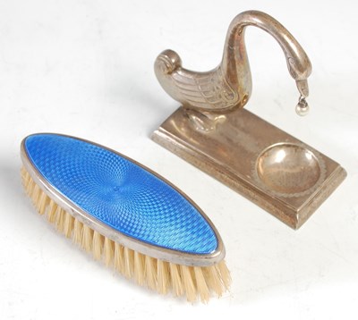 Lot 295 - A silver and blue enamel mounted brush;...