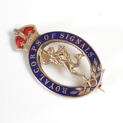 Lot 371 - A yellow metal, blue and red enamel Royal...