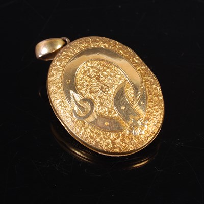 Lot 382 - A late 19th century yellow metal oval shaped...