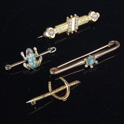 Lot 388 - Four assorted brooches, to include a late 19th...