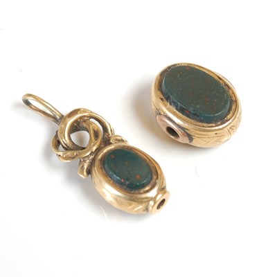 Lot 394 - A yellow metal mounted oval fob spinner...