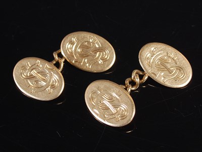 Lot 398 - A pair of 18ct gold oval cufflinks, engraved...