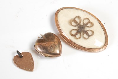 Lot 406 - A late 19th century yellow metal oval shaped...