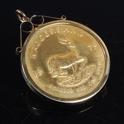 Lot 491 - A South African full Krugerrand, dated 1979,...