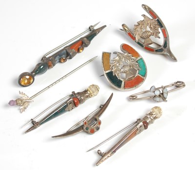 Lot 416 - A group of eight assorted Scottish white metal...