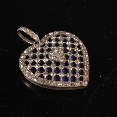 Lot 428 - A white metal and paste set heart shaped...