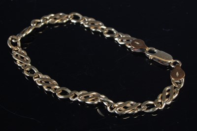 Lot 448 - A 9ct gold bracelet, approximately 19.5cm long,...