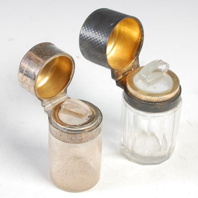 Lot 464 - Two silver mounted glass scent bottles, the...