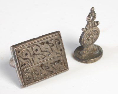 Lot 485 - Two Middle Eastern white metal seal stamps....