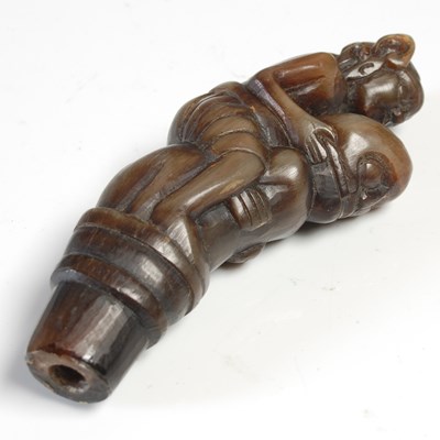 Lot 609 - An Asian carved horn dagger handle, carved...