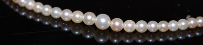 Lot 78 - A single strand graduated pearl necklace with...