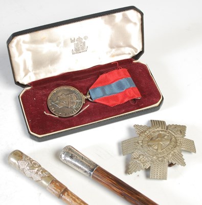 Lot 581 - A Royal Mint Imperial Service medal, in...