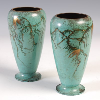 Lot 588 - A pair of WMF Ikora bronze vases, with...