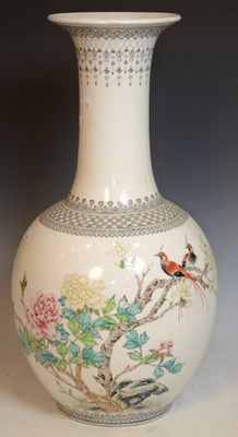 Lot 780 - A Chinese porcelain Famille rose bottle vase,...