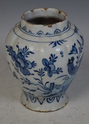 Lot 839 - An antique Dutch Delft pottery vase, decorated...