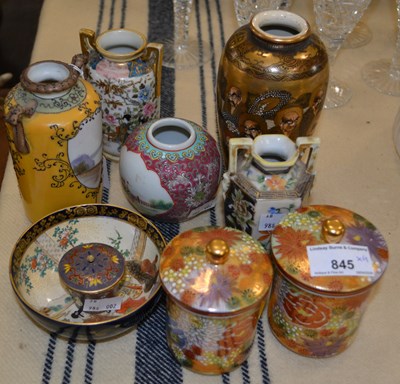 Lot 845 - A group of Japanese and Chinese ceramics to...
