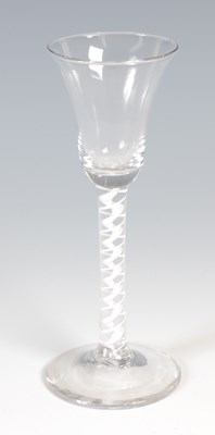 Lot 649 - An 18th century English opaque twist wine...