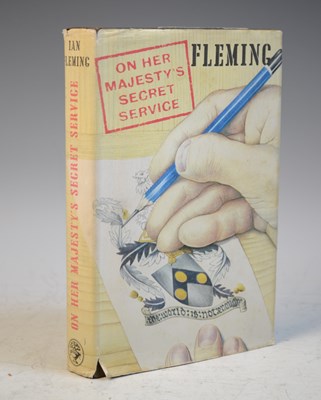 Lot 857 - A first edition copy of On Her Majesty’s...