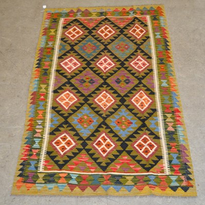 Lot 1214 - A Maimana Kilim rug, worked in coloured...