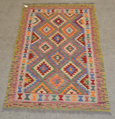 Lot 1215 - A Chobi Kilim rug, worked in coloured threads,...