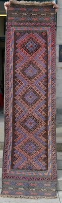 Lot 1221 - A Persian runner, the rectangular field...