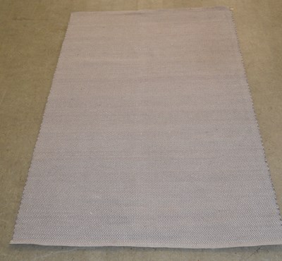 Lot 1229 - Andrew Martin, a cotton herringbone carpet /...