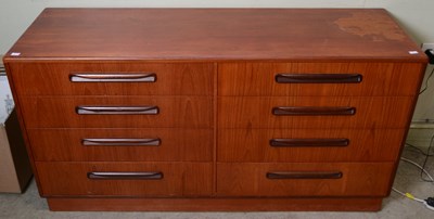 Lot 822 - A mid-century teak eight drawer chest by...