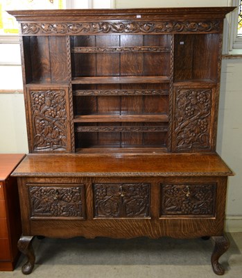 Lot 831 - An early 20th century oak dresser, featuring...