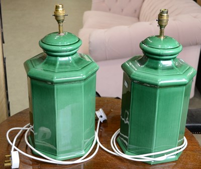 Lot 830 - A pair of decorative green glazed pottery...