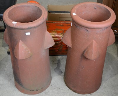 Lot 836 - A pair of 20th century terracotta chimneypots,...