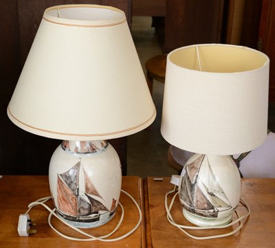Lot 861 - A near pair of ceramic table lamps, hand...