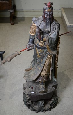 Lot 518 - A large Chinese carved giltwood and polychrome...