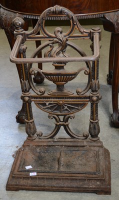 Lot 870 - A 19th century cast iron stick stand, the back...