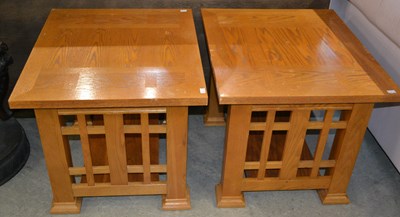 Lot 868 - A pair of modern blonde oak rectangular side...
