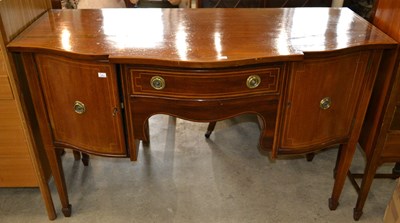 Lot 884 - A 20th century mahogany sideboard, featuring a...