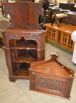 Lot 889 - A 19th century oak carved corner cupboard in...