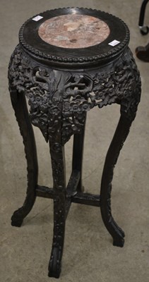 Lot 891 - A Chinese darkwood jardiniere stand, with...