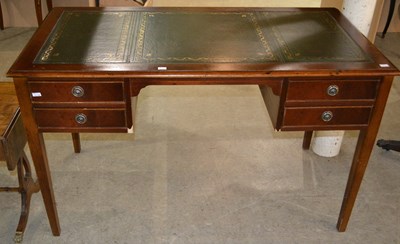 Lot 917 - An early 20th century mahogany knee hole desk,...