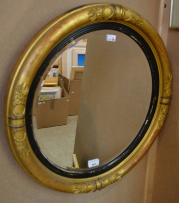 Lot 804 - A 19th century Regency style giltwood convex...